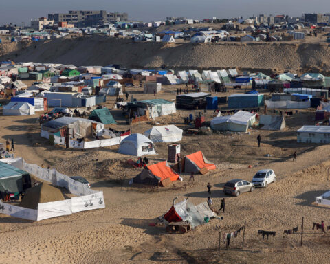 Gaza humanitarian emergency civilians receiving aid supplies 2026