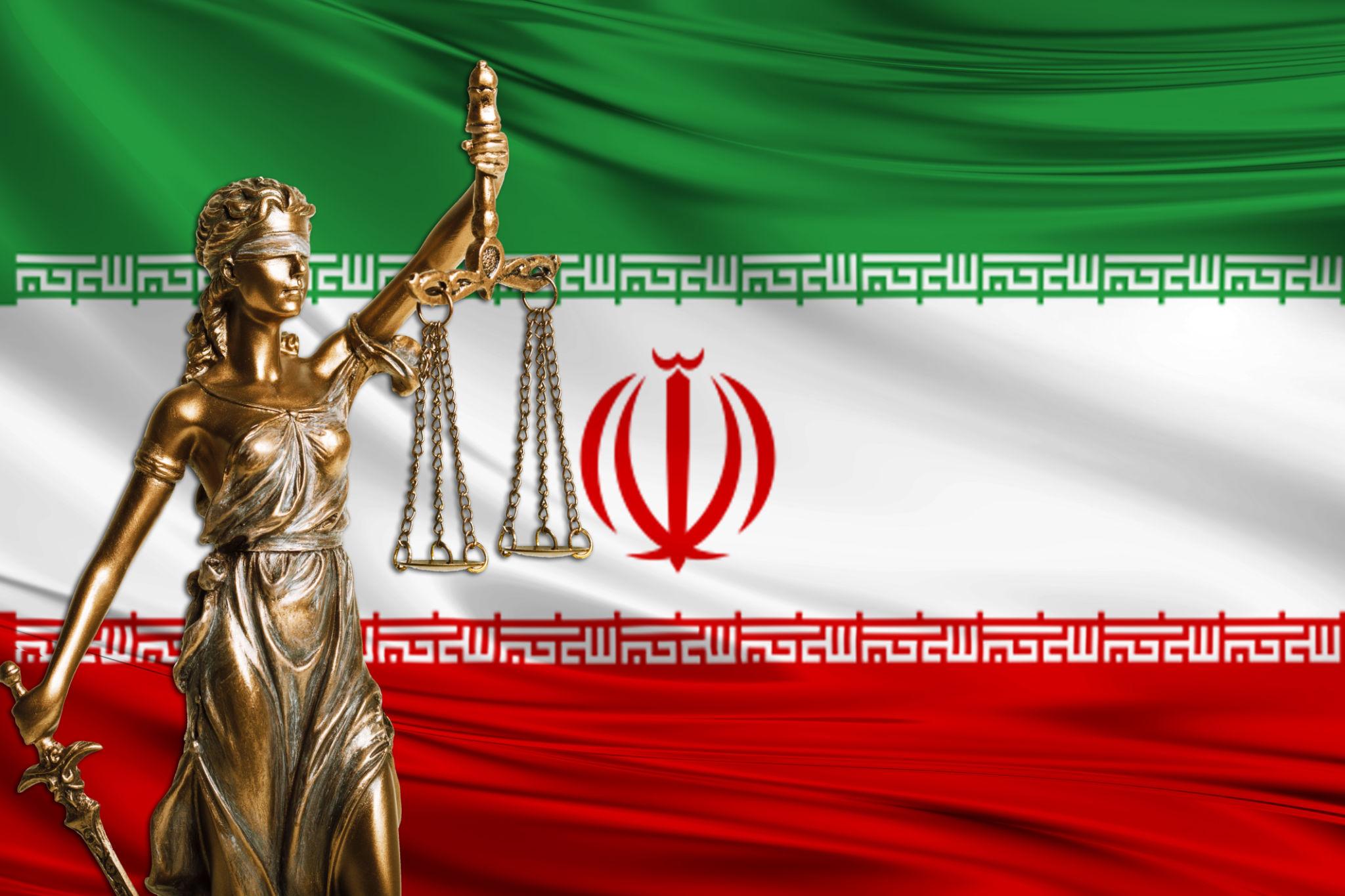 Iran Legal System Faces Rising Global Scrutiny Over Enforcement and Court Practices – Tehran 2026 4 Iran legal system analysis represented through legal books and justice symbols