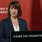 a woman standing at a podium