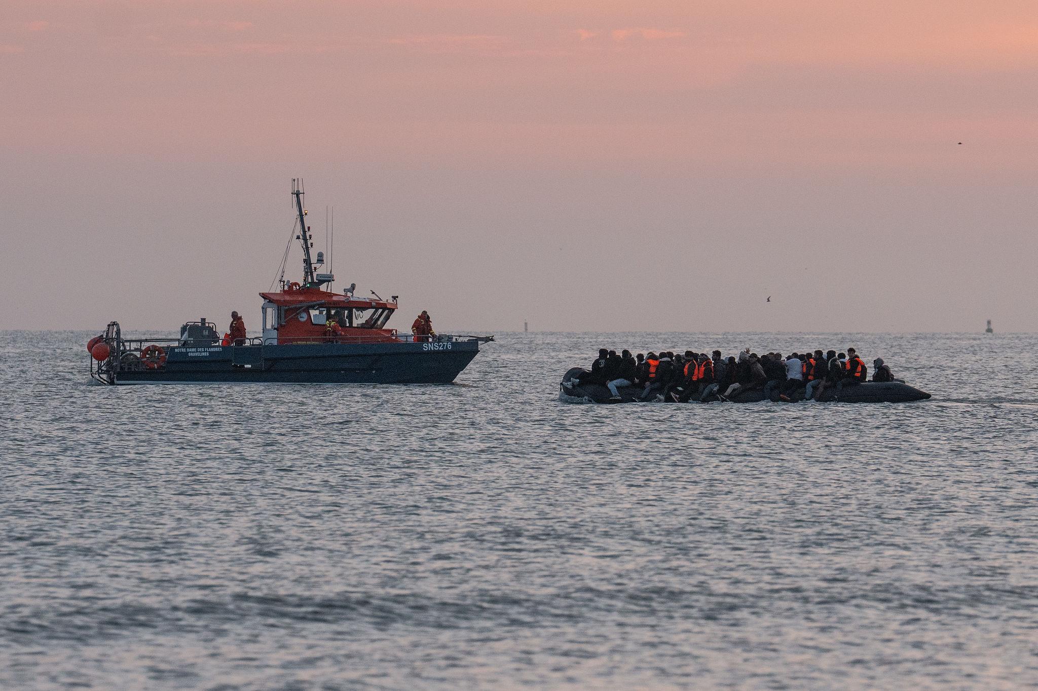 Migrants departing French coast amid the Channel migration crisis