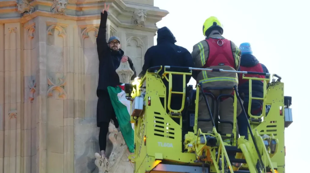 Man scales Westminster tower, negotiators intervene