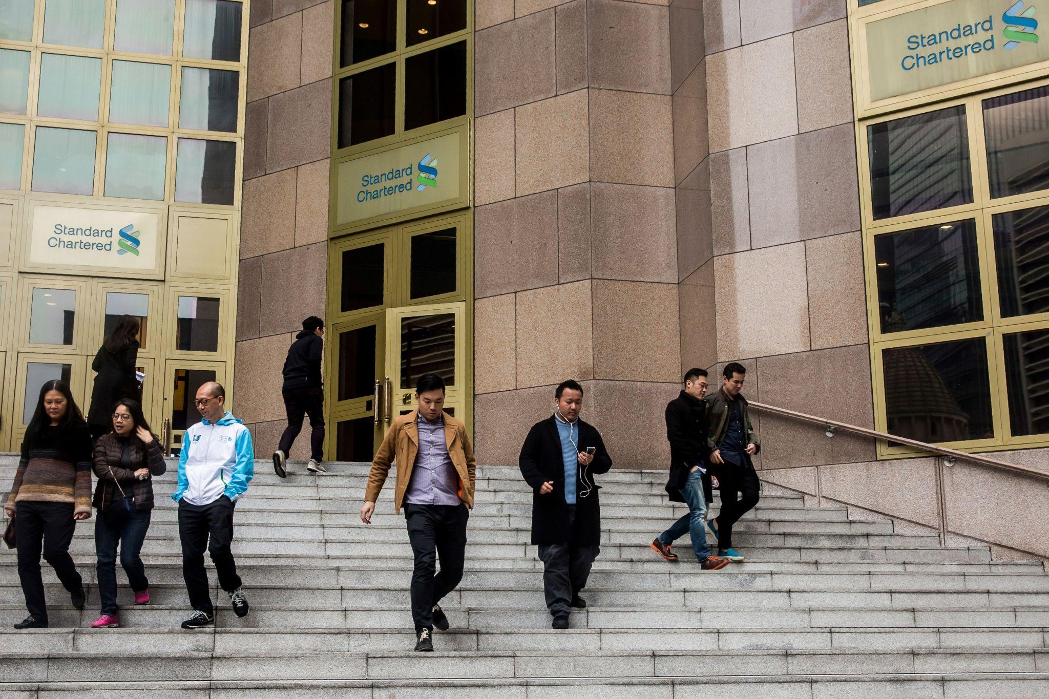 Standard Chartered to Cut 7,000 Jobs as AI Expands Across Banking Operations in Hong Kong 2026 4 Corporate banking offices adapting to AI job cuts and automation strategies