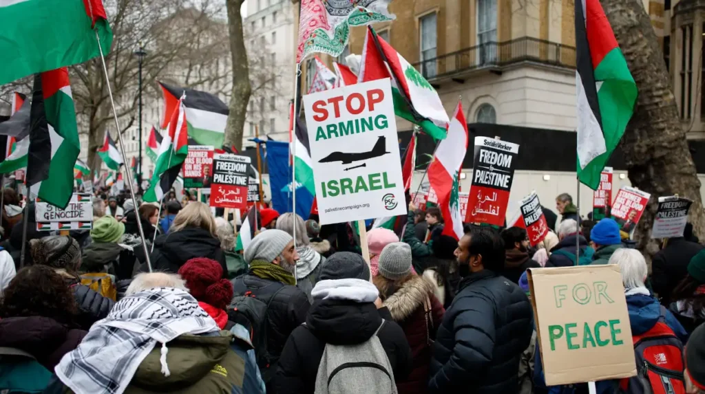 Pro-Palestine protesters rally in rain in central London