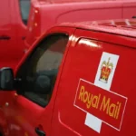 Royal Mail owner cuts jobs and raises prices following £134M write-down