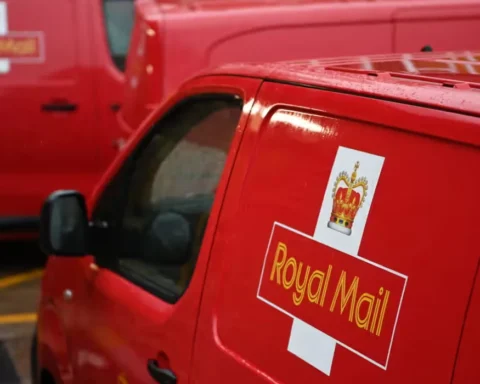Royal Mail owner cuts jobs and raises prices following £134M write-down
