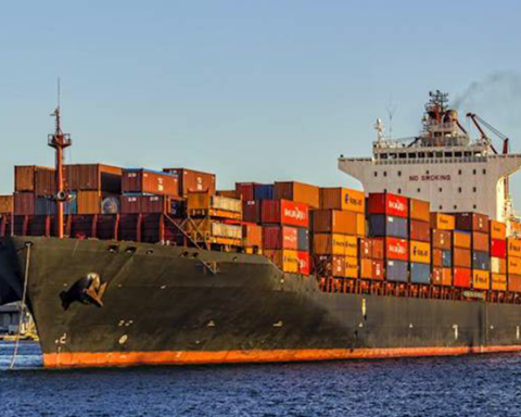 Global trade route disruption affecting cargo ships in the Strait of Hormuz