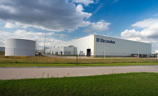 EU manufacturing jobs impact shown through idle production line after shutdown