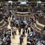 Global stock markets react to central bank policy signals