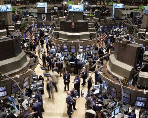 Global stock markets react to central bank policy signals