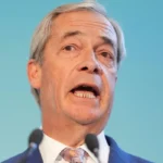 UK PM Keir Starmer urges Reform leader Nigel Farage to apologise for racial abuse