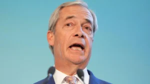 UK PM Keir Starmer urges Reform leader Nigel Farage to apologise for racial abuse