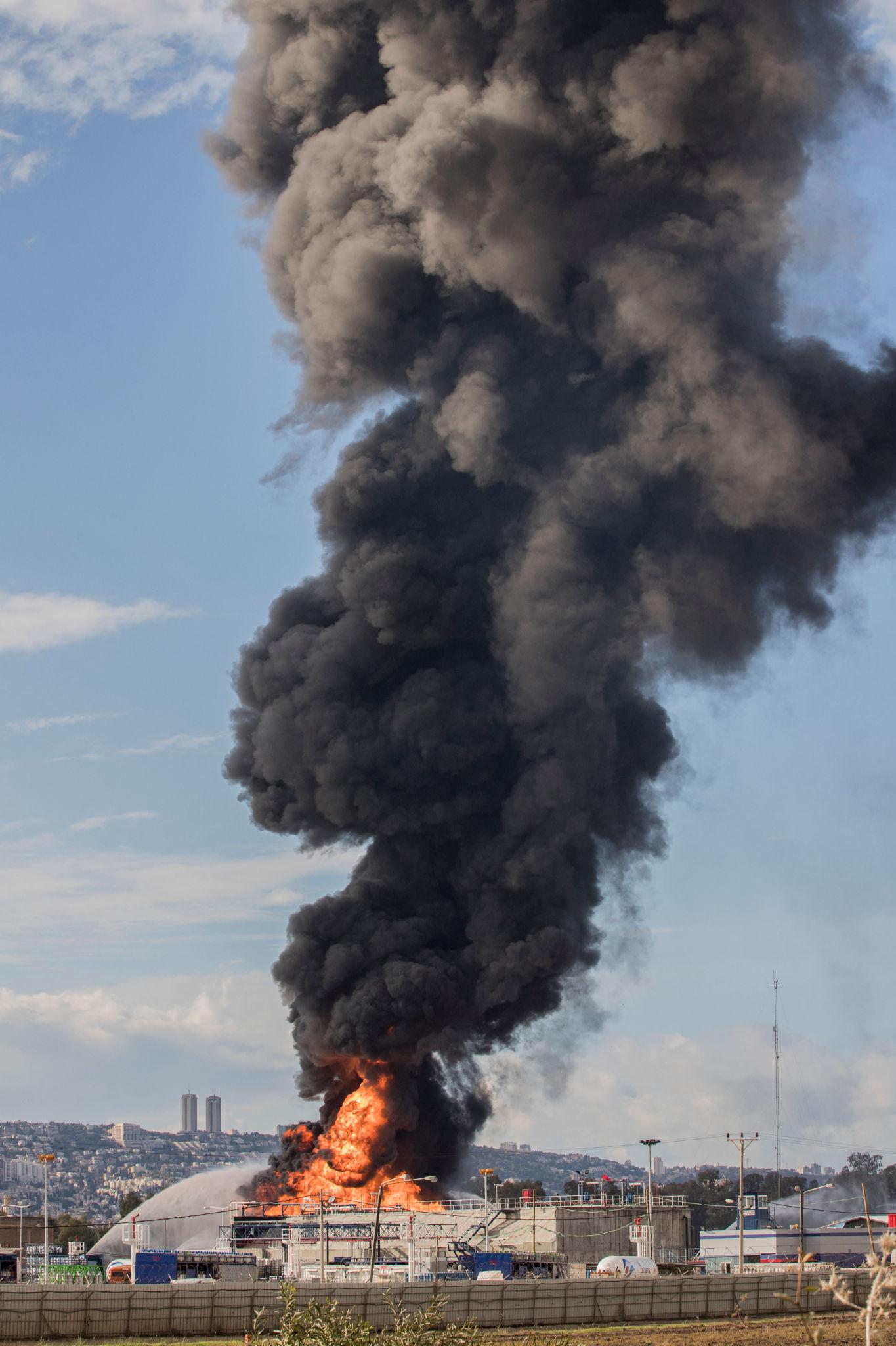 Haifa oil refinery strike missile debris damage near refinery site