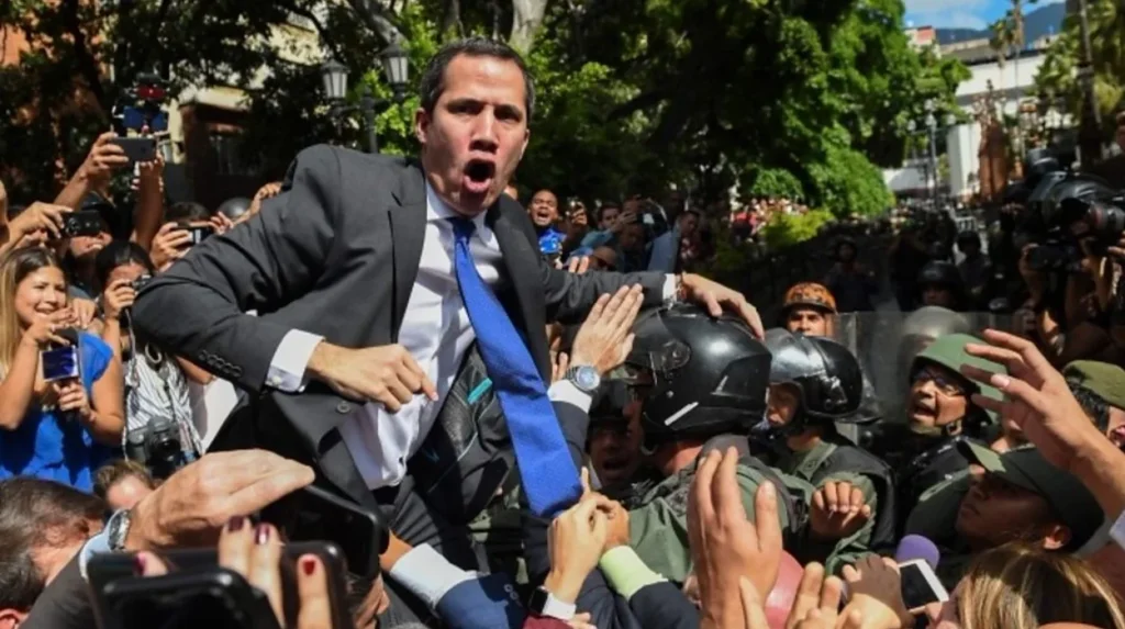 Venezuela’s Guaidó forces his way into assembly after stand-off