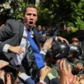 Venezuela’s Guaidó forces his way into assembly after stand-off