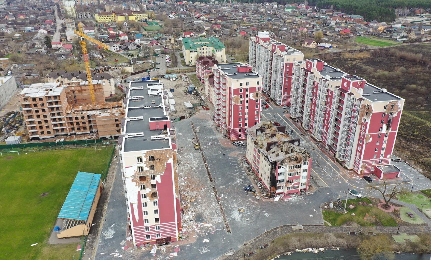 humanitarian crisis recovery aid workers distributing supplies to civilians