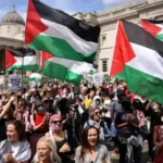 police controlling protest crowd amid Iran conflict protest impact tensions