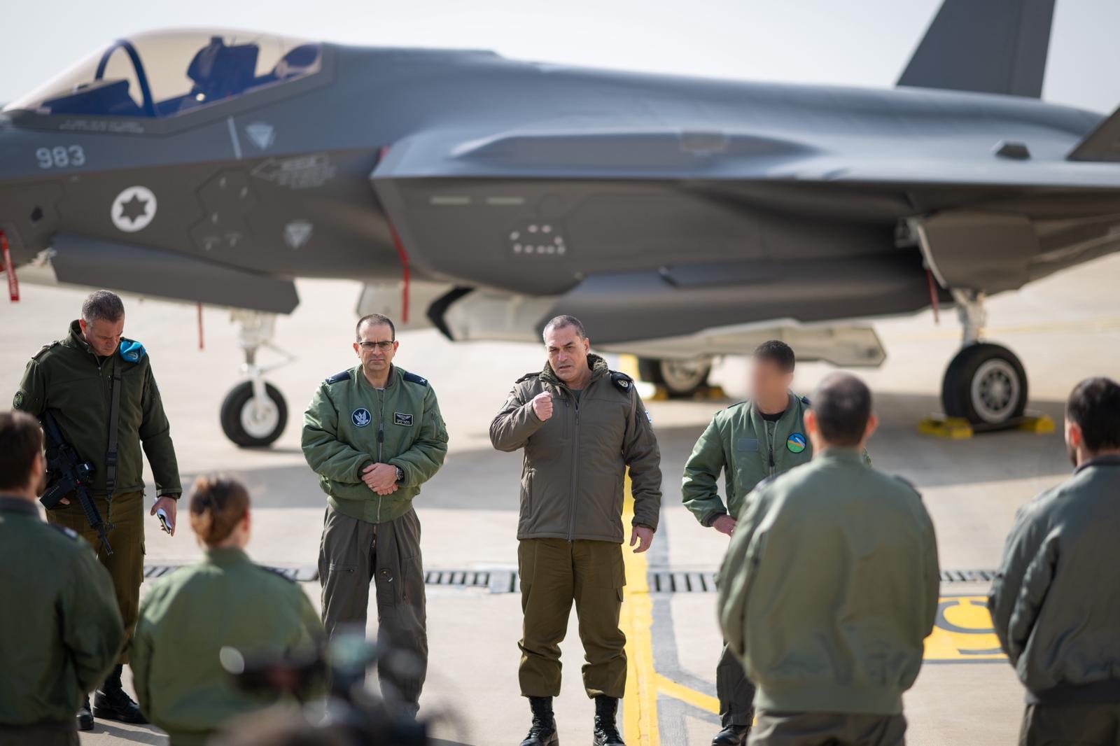 Tehran infrastructure strikes showing smoke rising over the city after airstrike