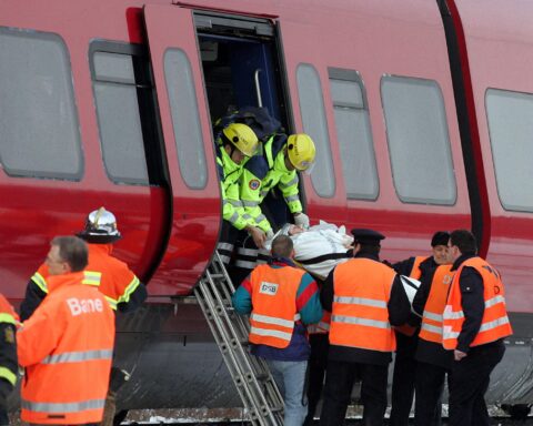 damaged train cars after Denmark rail disruption news crash