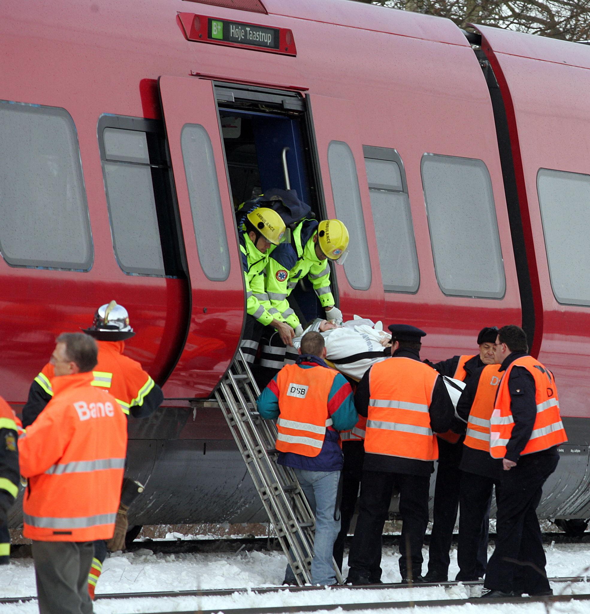 damaged train cars after Denmark rail disruption news crash