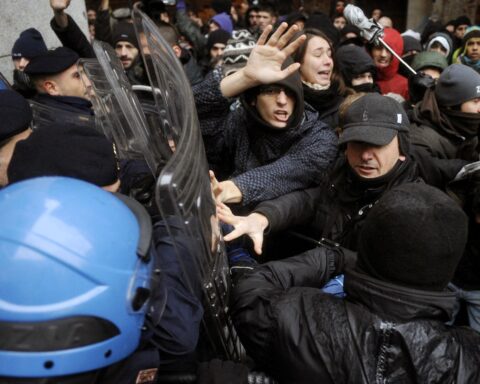 Italian police clashes trigger security response in Milan city center