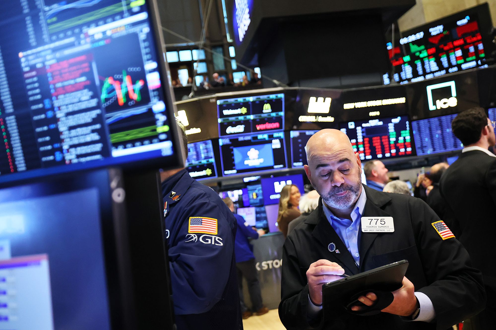 Stock market volatility rattles investors in New York 2026 2 Stock exchange screens show stock market volatility