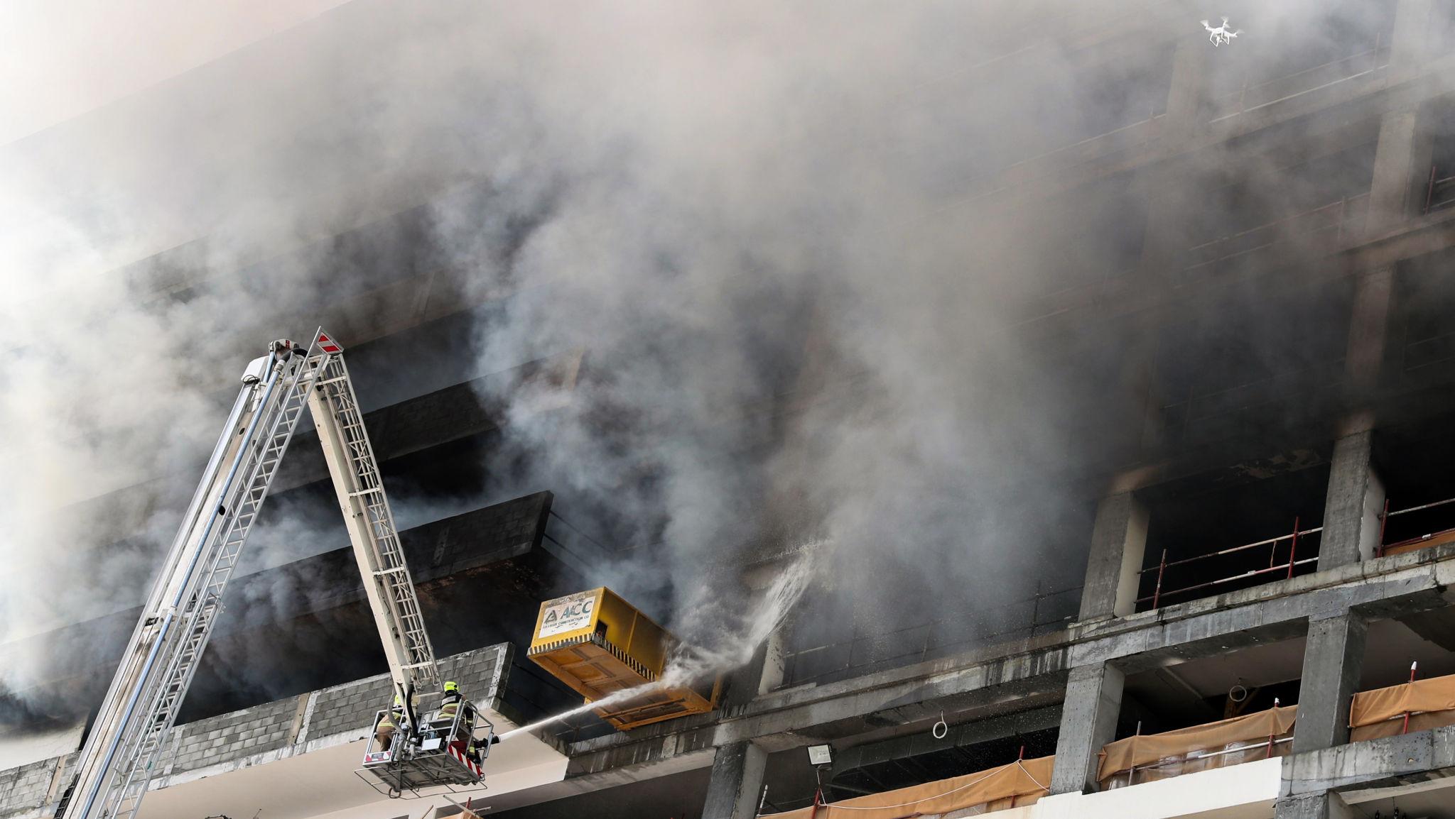 Iranian Missile Attacks UAE 4 Dead as Tensions Surge 2026 1 Emergency response teams working after Iranian missile attacks UAE