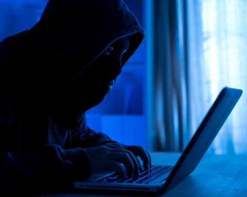 Russian hackers breach emails shown through cyber code and hacking interface