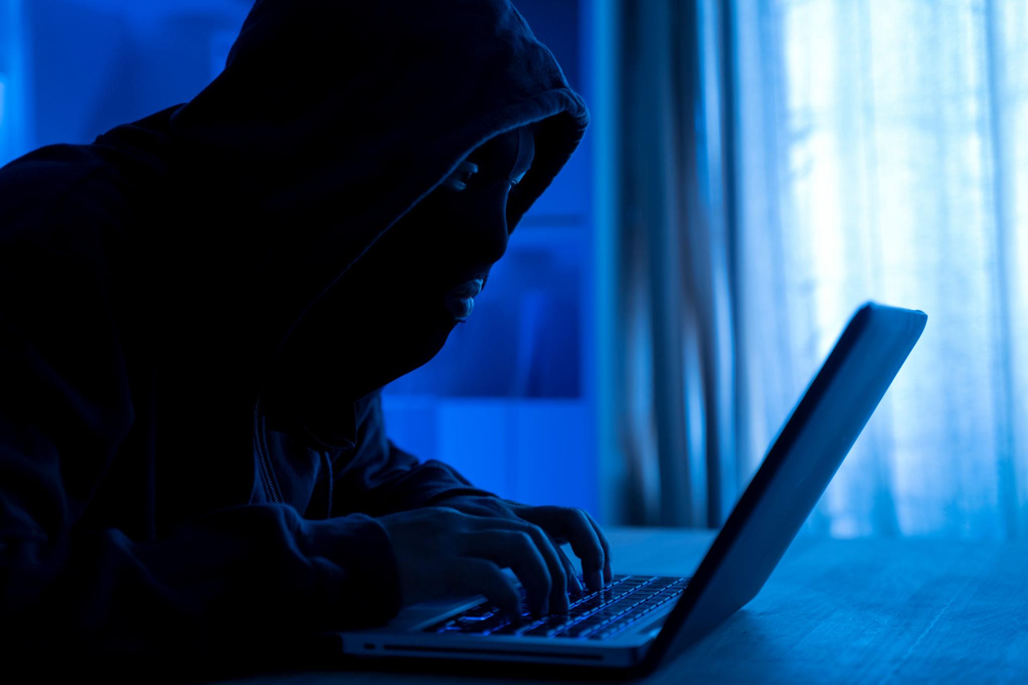 Russian hackers breach emails shown through cyber code and hacking interface