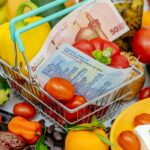 sanctions impact Iran economy currency decline exchange market scene