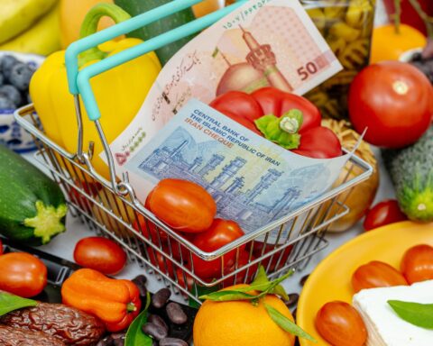 sanctions impact Iran economy currency decline exchange market scene