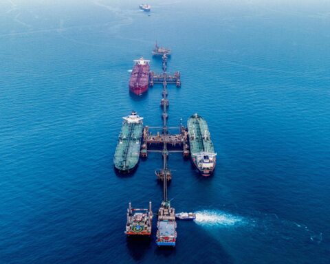 Oil tankers passing through the Persian Gulf highlighting Strait of Hormuz security concerns