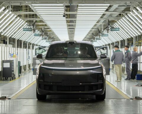 Global EV competition showing electric vehicles in urban market 2026