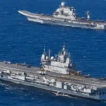 cargo ships Strait of Hormuz Iran oil route tensions conflict