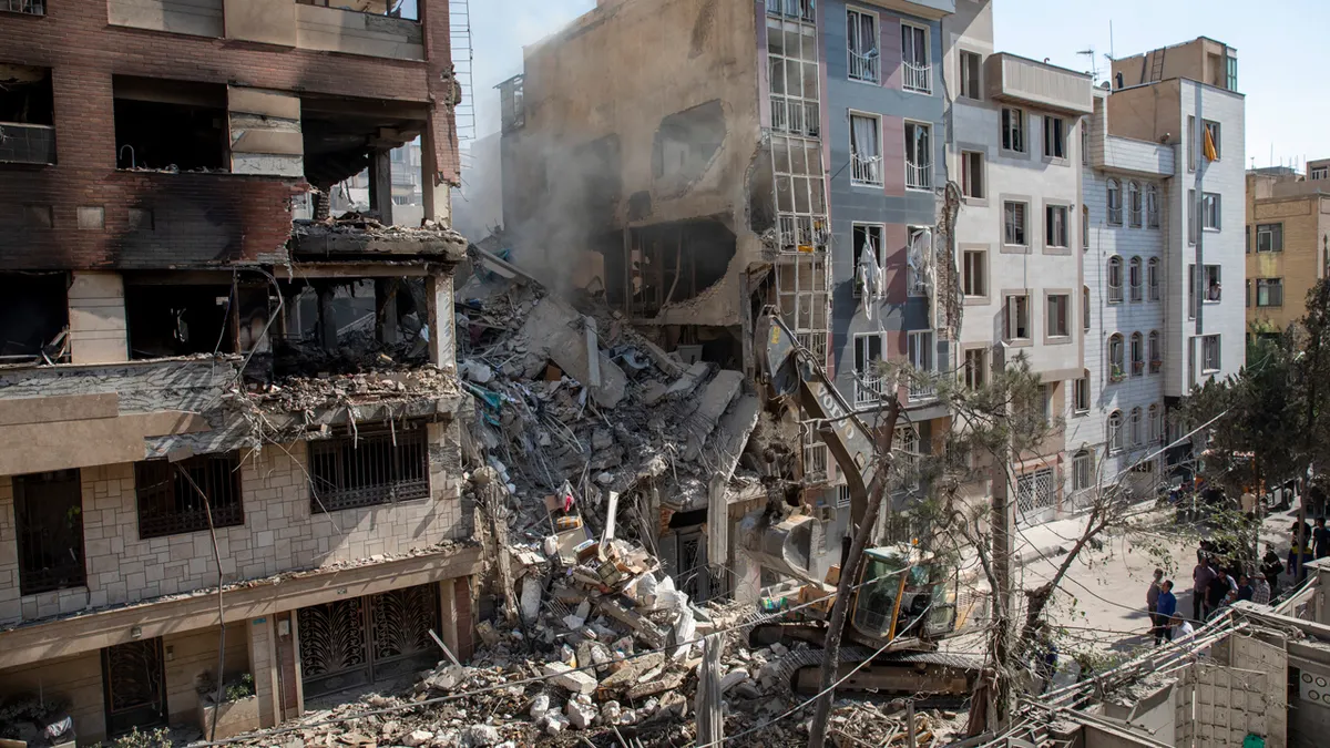 Iran humanitarian crisis after attacks damage residential buildings in Tehran