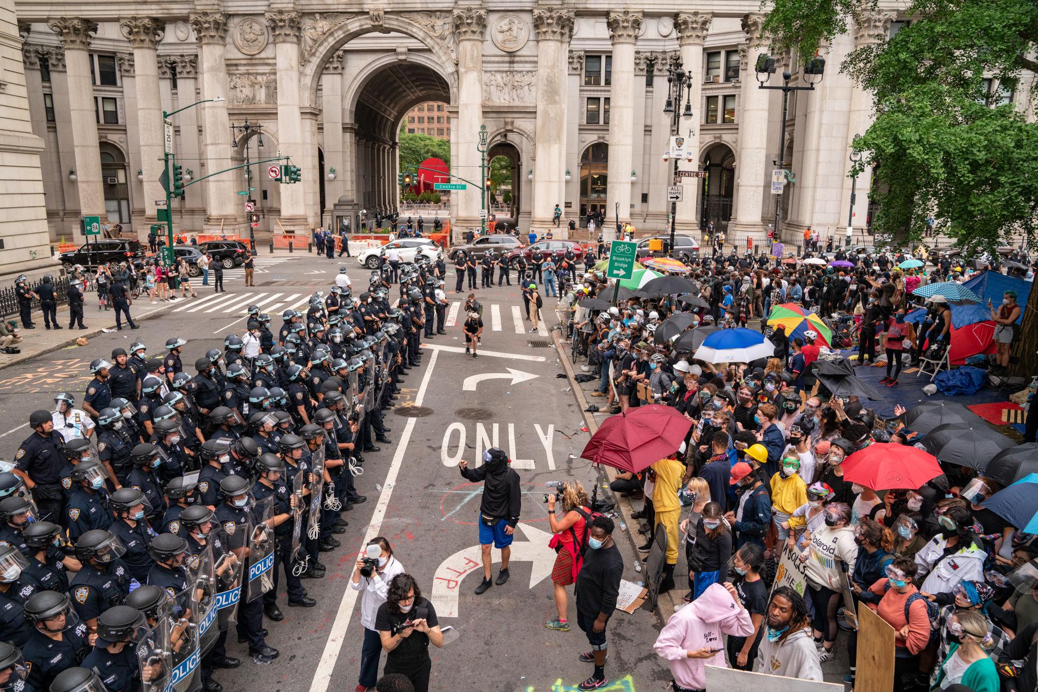 US foreign policy protests activists holding anti arms sales signs in New York