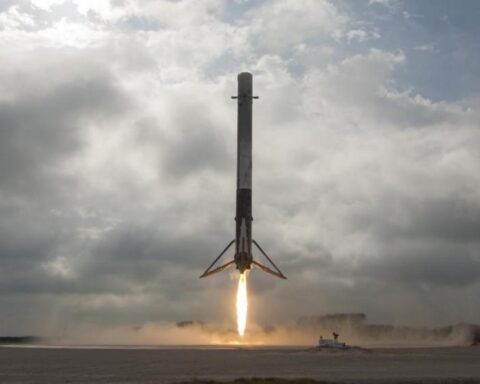 rocket booster landing success showing Blue Origin booster touching down on landing pad