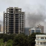 Pakistan air strike on Kabul causing explosion and smoke over city skyline in 2026