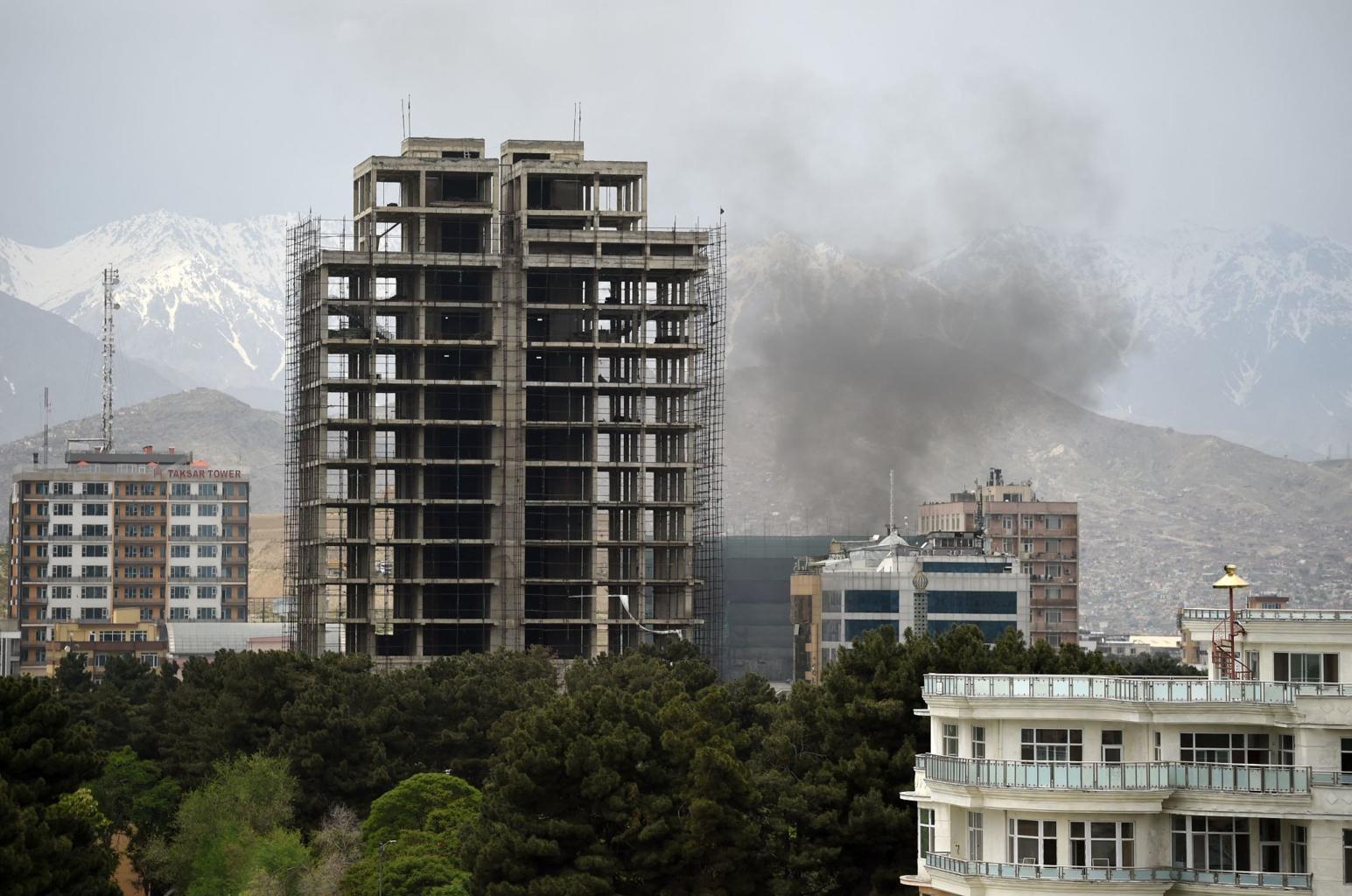 Pakistan air strike on Kabul causing explosion and smoke over city skyline in 2026