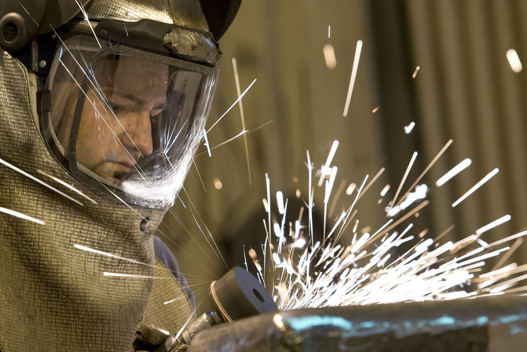 Britain Unveils Massive Industrial Recovery Plan Amid Economic Pressure in London 2026 1 British factory workers during UK industrial strategy 2026 rollout