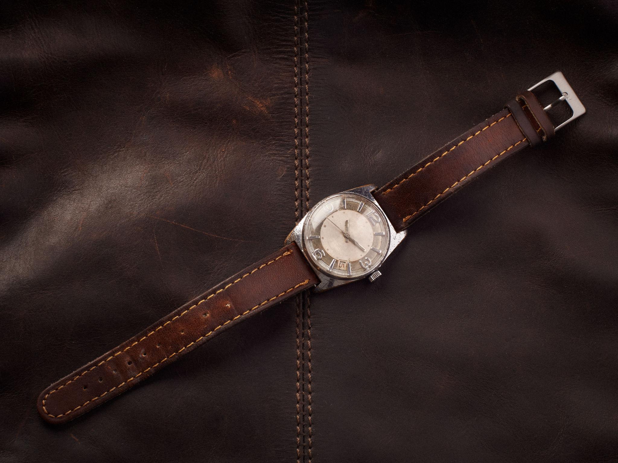 global luxury market trends featuring vintage wristwatch design with classic aesthetics