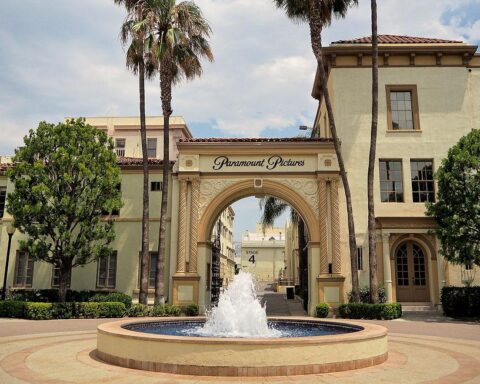 Hollywood merger controversy involving Warner Bros studio and potential industry consolidation