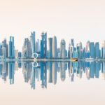 Middle East aviation accident crash site with investigation teams in Qatar desert