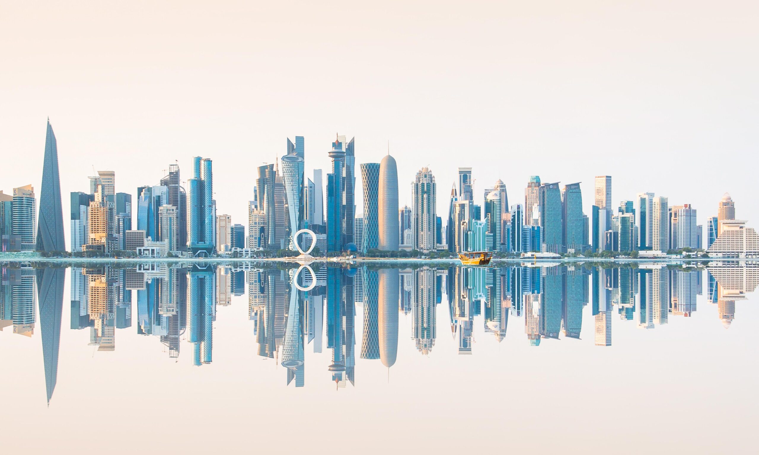 Middle East aviation accident crash site with investigation teams in Qatar desert