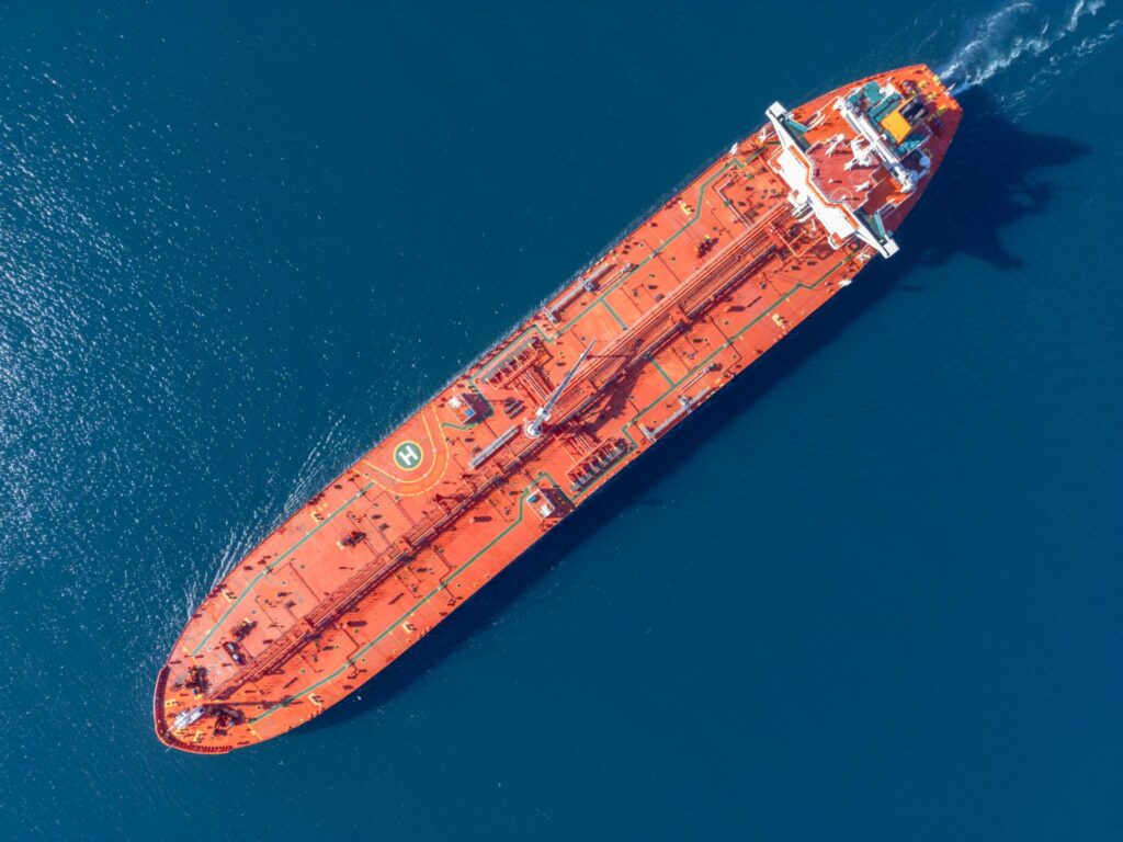 oil tanker sailing in the Persian Gulf during rising global oil supply risk