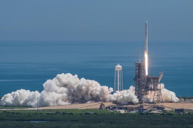 SpaceX investment links showing Tesla Cybertruck operations near aerospace facility