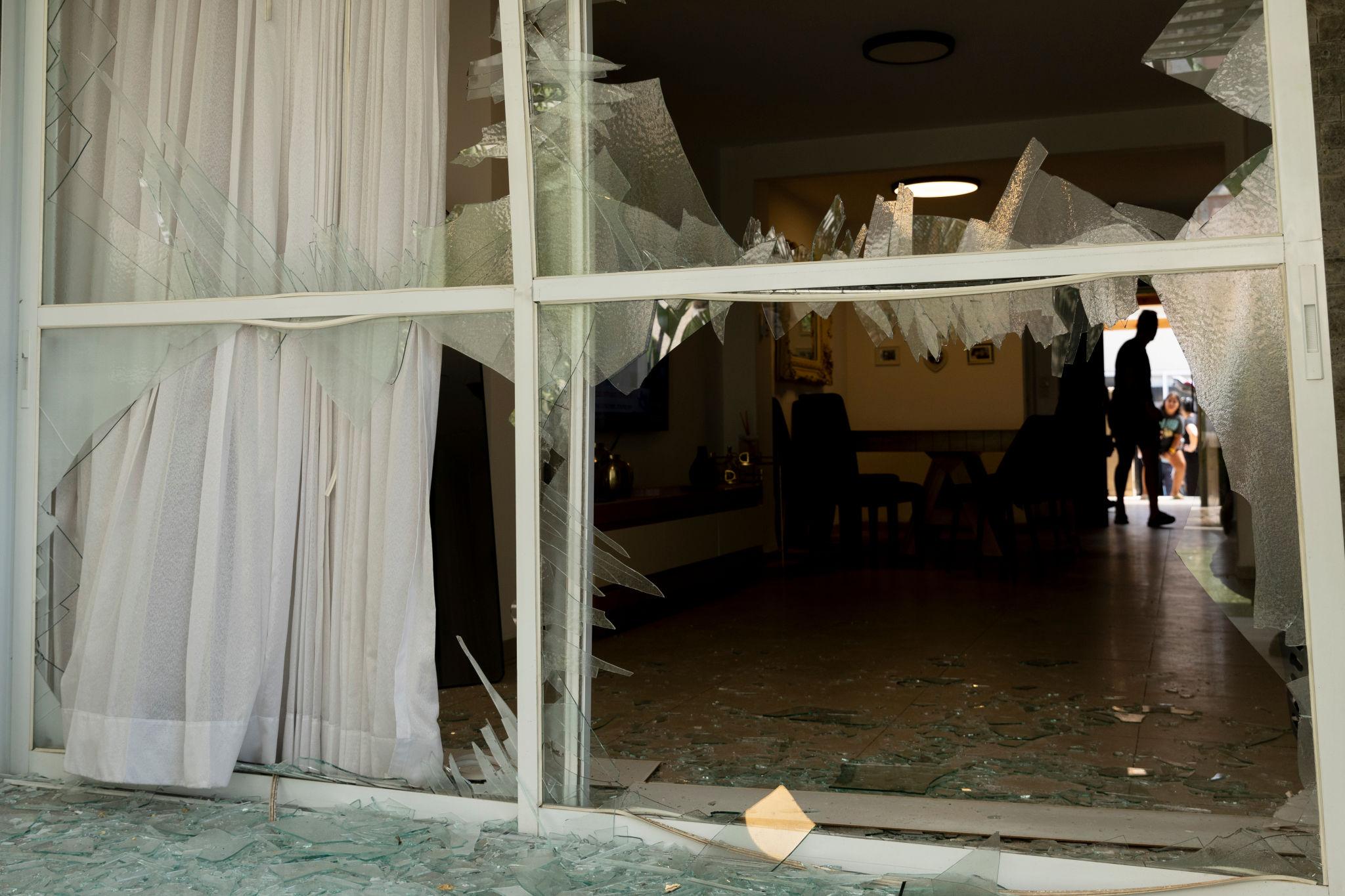 Middle East security crisis with Iron Dome intercepting incoming missiles at night