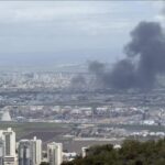 Middle East war escalation with ambulances responding to injuries in northern Israel