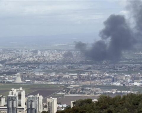 Middle East war escalation with ambulances responding to injuries in northern Israel