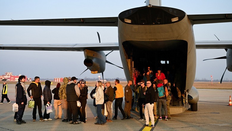 Passengers boarding US emergency flights during Middle East evacuation operation 2026