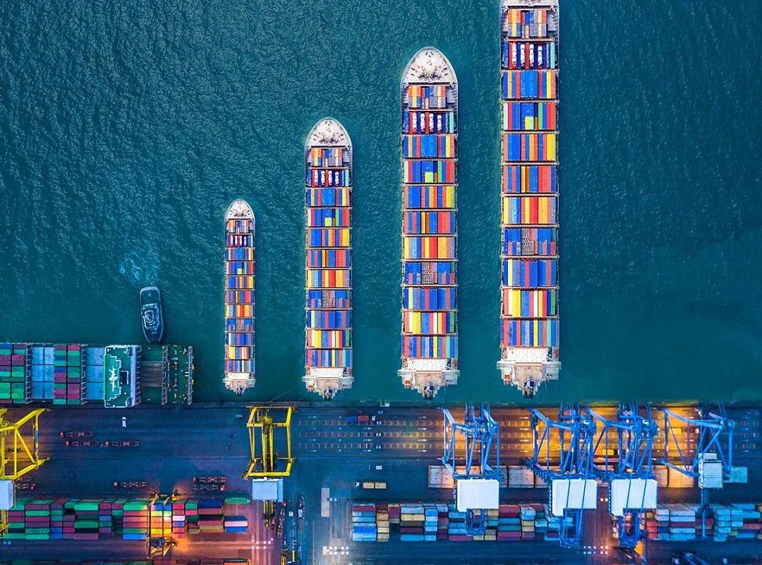 Cargo ship transporting goods during international shipping trends slowdown